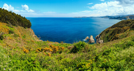 Fototapeta na wymiar Atlantic ocean summer coastline landscape (Galicia, Spain). Two shots stitch panorama.