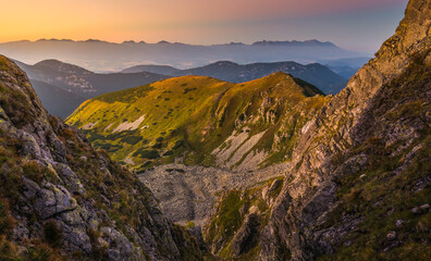 Naklejka na ściany i meble Mountain Landscape in Colourful Sunset. View from Mount Dumbier in Low Tatras, Slovakia. West and High Tatras Mountains in Background.