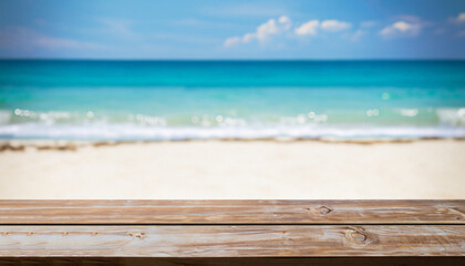 Fototapeta premium Wood table top on blurred blue sea and white sand beach background