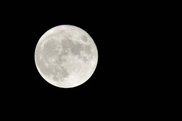 full moon in dark night sky