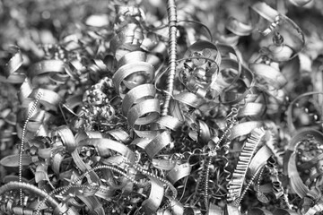 Steel scrap materials recycling. Aluminum chip waste after machining metal parts on a cnc lathe....