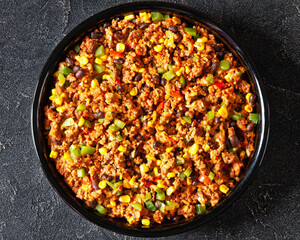 Mexican ground beef casserole with rice, beans