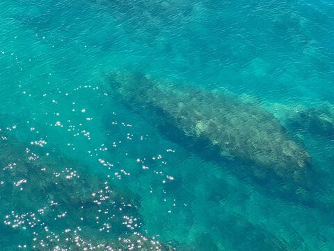 Sea water blue turquoise glittering seascape aqua.