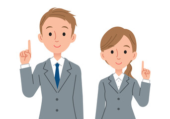 指差しで説明をするビジネスパーソン（男女）