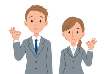 笑顔でOKサインをするビジネスパーソン（男女）