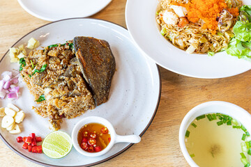 Fried Rice with crispy gourami fish - Asian food style. Traditional Thailand food,
