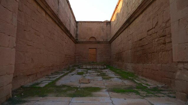 First-person view walking in old building of Hatra archaeological site in Iraq. FPV