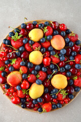 Mix of various garden berries in a plate