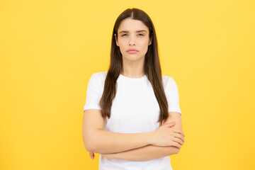 Portrait of young woman thinking, looking up empty space. Thoughtful serious model in studio looking away. Girl thought choose decide solve problems.