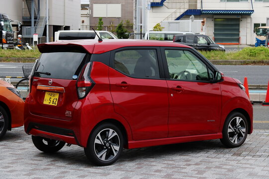 CHIBA, JAPAN - May 15, 2020: A Nissan Dayz Highway Star Hybrid outside a Nissan car showroom in Chiba City.