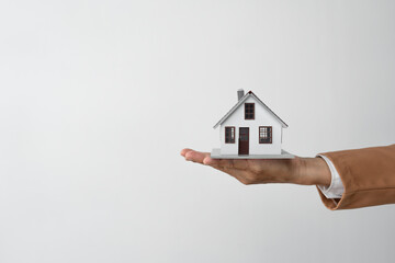 Real estate agents, investors handing over homes to clients after agreeing on house purchase agreements and signing contracts, loans, insurance, copy space, panorama, banner