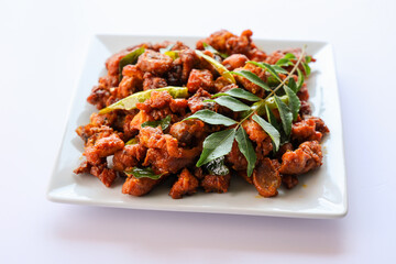 Fried chicken Kebab or Kabab, Chicken Tikka Masala dark black background Bangalore Hyderabad South India. Top view of Indian non veg food.