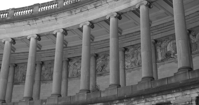 Columns Of The Triumphal Arch And U-shaped Arcade In Cinquantennaire Parc Or Jubelpark In Brussels, Belgium - black and white