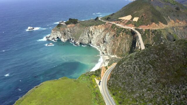 Aerial video view of California coastline with mountains and ocean