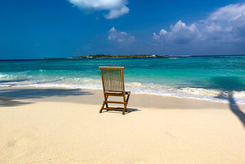 Summer palm tree and Tropical beach with blue sky background.