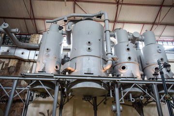 Steam engine tanks in a sugar factory