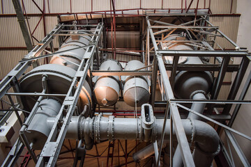 Steam engine tanks in a sugar factory