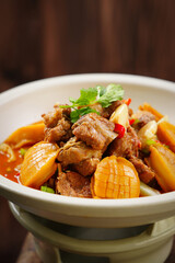 Chinese braised pork ribs, Chinese food made from pork ribs, cilantro, onion