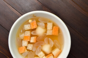 Wedang Ronde, Javanese traditional drink. Served with ginger soup, coconut flesh and glutinous riceball with peanut inside.