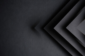 dark background on black paper with an image of triangles