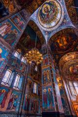 Fototapeta na wymiar A Heavenly Mosaic Symphony: Step into the Enchanted Interior of the Church of the Savior on Spilled Blood and be Transfixed by a Dazzling Display of Sacred Artistry.
