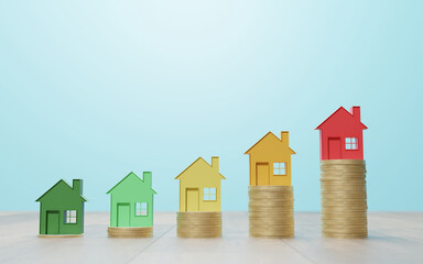 Sustainable Energy Efficiency in Real Estate: Color houses on coin stacks