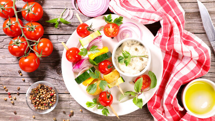 Fototapeta na wymiar vegetable skewer and dipping sauce- summer party, vegetarian bar-b-q, health food concept