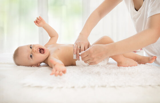 Nappy Baby On Changing Mat