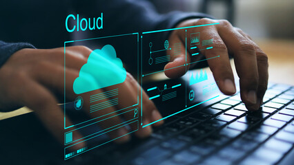 Businessman hand with laptop and cloud computing system for transfer data information and upload download application. Technology transformation concept.