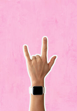 Start watch on female hand, hand gesture I Love you, ILY sign gesturing, American Sign Language.