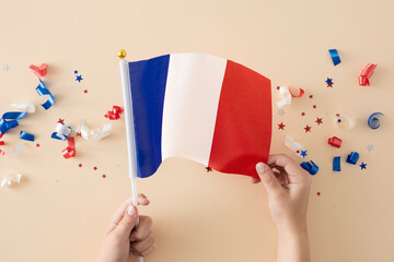 Concept for patriotic festivities on Bastille Day. First person top view photo of french flag in...