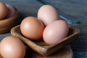 Chicken eggs lying on the table