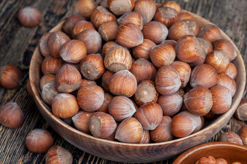 not peeled from the hard shell of useful hazelnuts