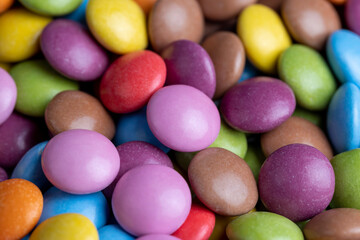 Fototapeta na wymiar Multicolored chocolates with chocolate filling