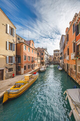 Fototapeta na wymiar The canal in Venice historic old town at sunny day, Italy, Europe.