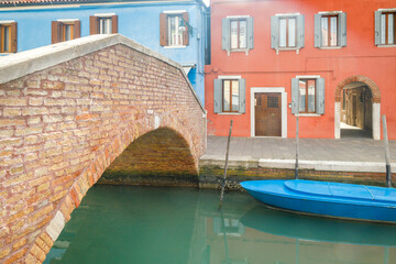 Obraz na płótnie Canvas Stone bridge over the canal in Burano island near of Venice, Italy, Europe.