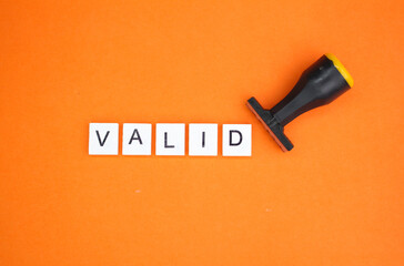 stamp with the word valid. the concept of confirmation or confirmed. confirmation of an item or content