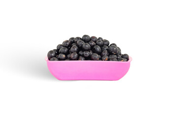 Closeup of the fruit Karonda, Bengal-Currants, Black Currants, and Carandas-Plum 