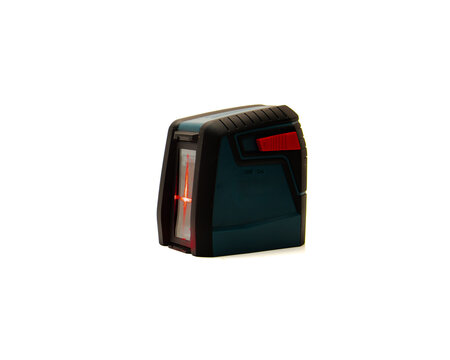 Bright cross beam red laser lines from laser level device precisely level and plumb, wide array of level and alignment applications isolated on white background