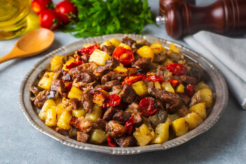 From Turkish cuisine; meat, vegetable kebab, casserole. Turkish name; Maras Tava or Kahramanmaras Tava - Orman Kebabi