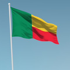 Waving flag of Benin on flagpole. Template for independence day