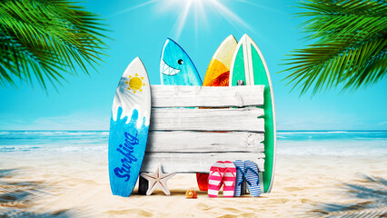 Surfboards and wooden sign on the beach