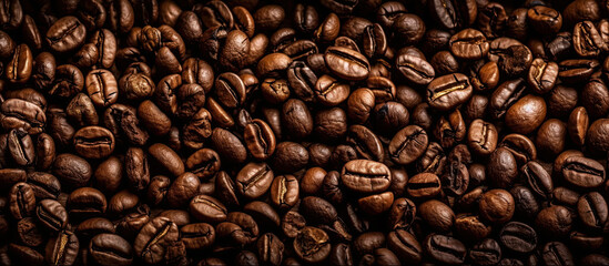 Naklejka premium Coffee beans. Generative AI illustration.Panoramic horizontal background of roasted coffee beans.
