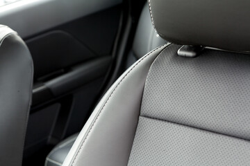 A closeup shot of the black interior of a modern suv car
