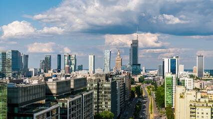 Fototapeta na wymiar Warsaw city center aerial landscape, skyscrapers panorama under blue cloudy sky