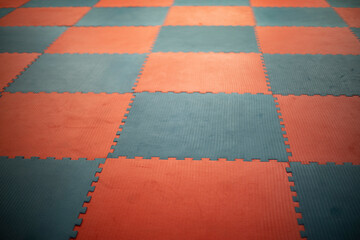 Flooring in gym. Workout mats. Details of gym.