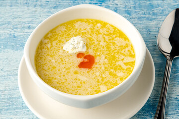 Seasoned fish soup on a white porcelain plate