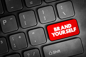 Brand Yourself text button on keyboard, concept background
