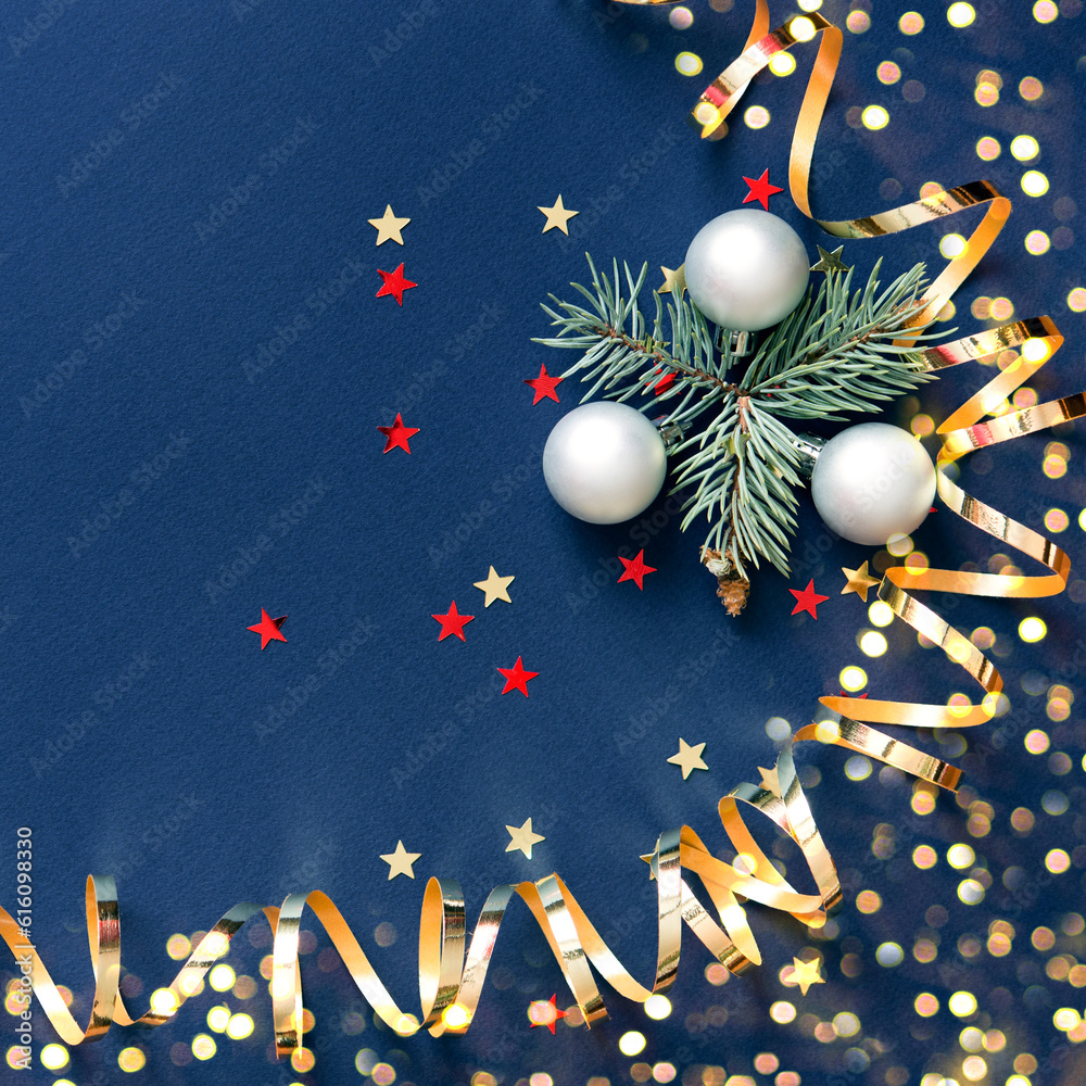 Poster Christmas card banner with round balls toys, Christmas tree branches and golden decorative ribbon, glitter stars and bokeh lights. Mockup for your congratulations. Blue background. Square.