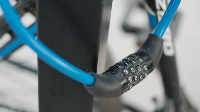 Combination lock on a bike left in the parking lot, close-up